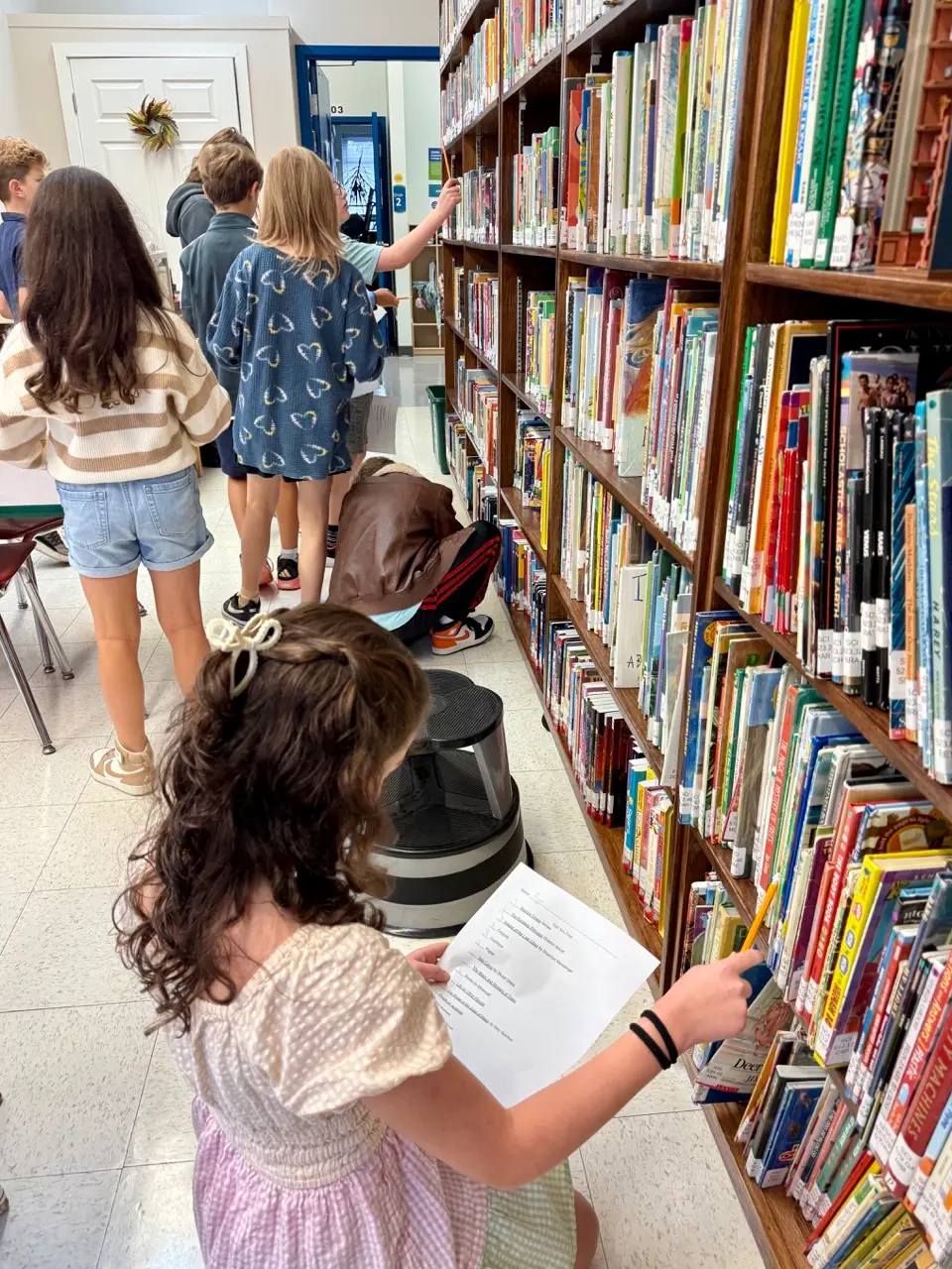 Students reflecting on their writing and sharing ideas with peers