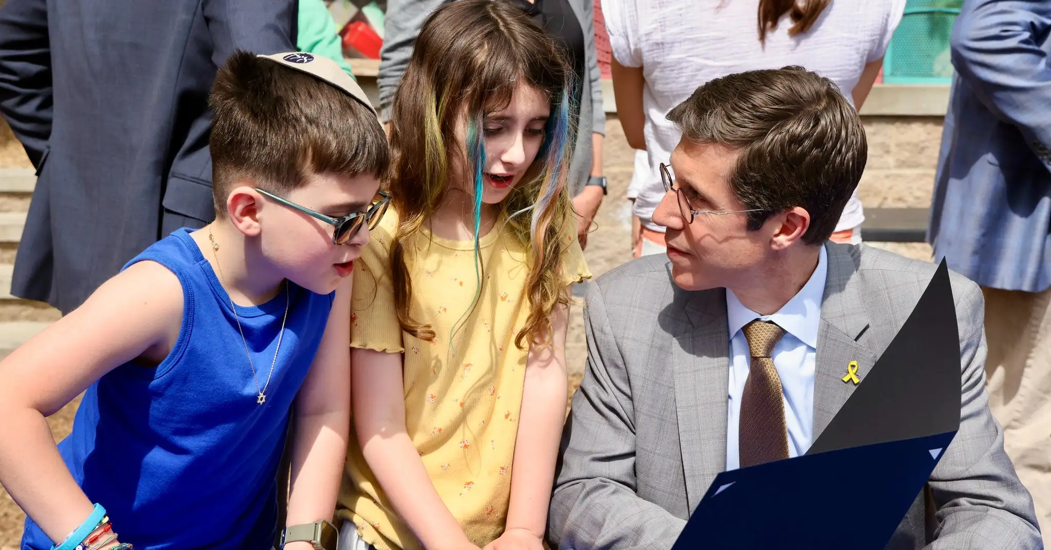 Student expressing creativity and inclusion through classroom work