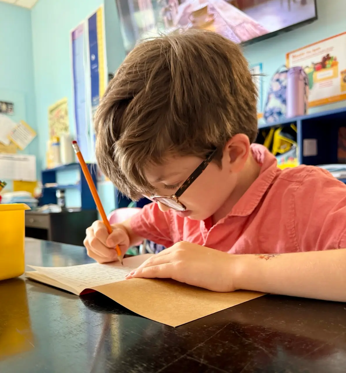 Teacher guiding students through diverse writing approaches in class