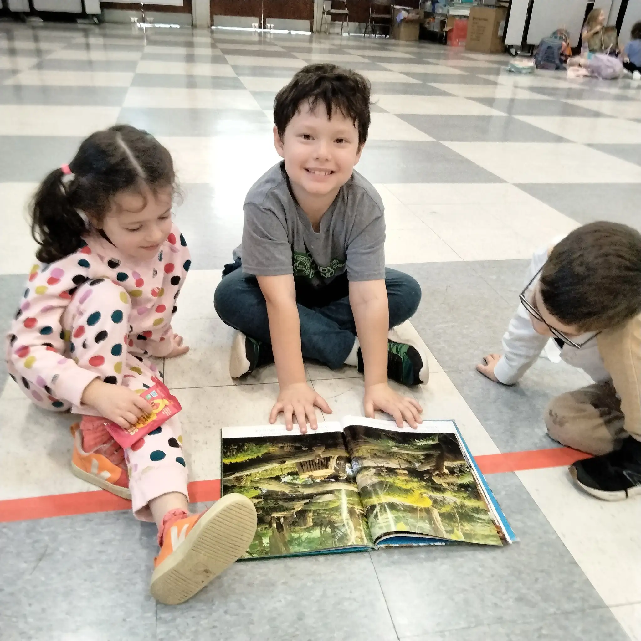 Students collaborating during Reading Buddies session